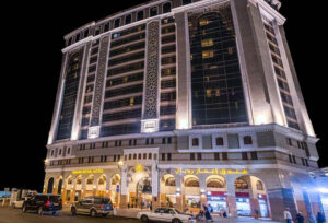 Emaar Royal Hotel Medina exterior at night near Masjid an-Nabawi