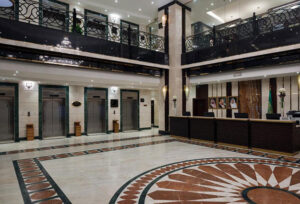 The exterior of Saja Al Madinah showcases its prime location in Madinah, offering easy access for Umrah pilgrims. A reliable hotel choice included in our deluxe Umrah packages.